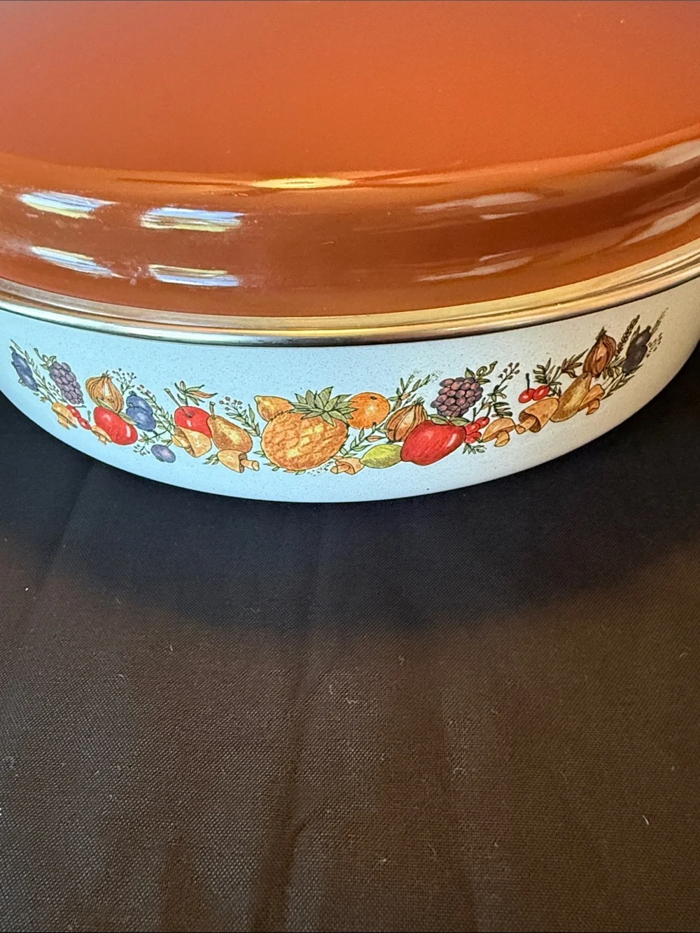1970s enamelware skillet  featuring a retro “Spice of Life” motif.